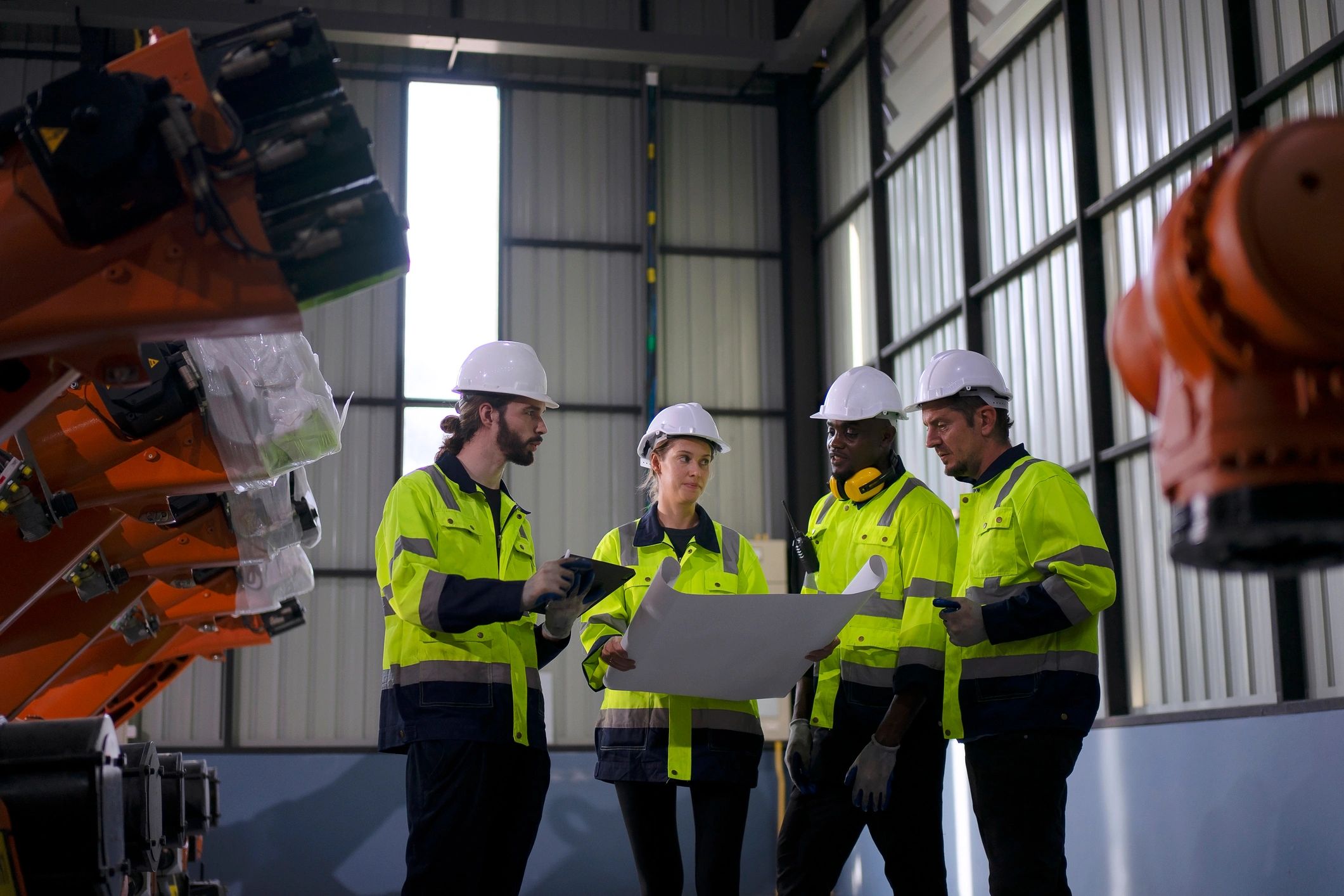 Engineer working with advanced robotic and technical equipment
